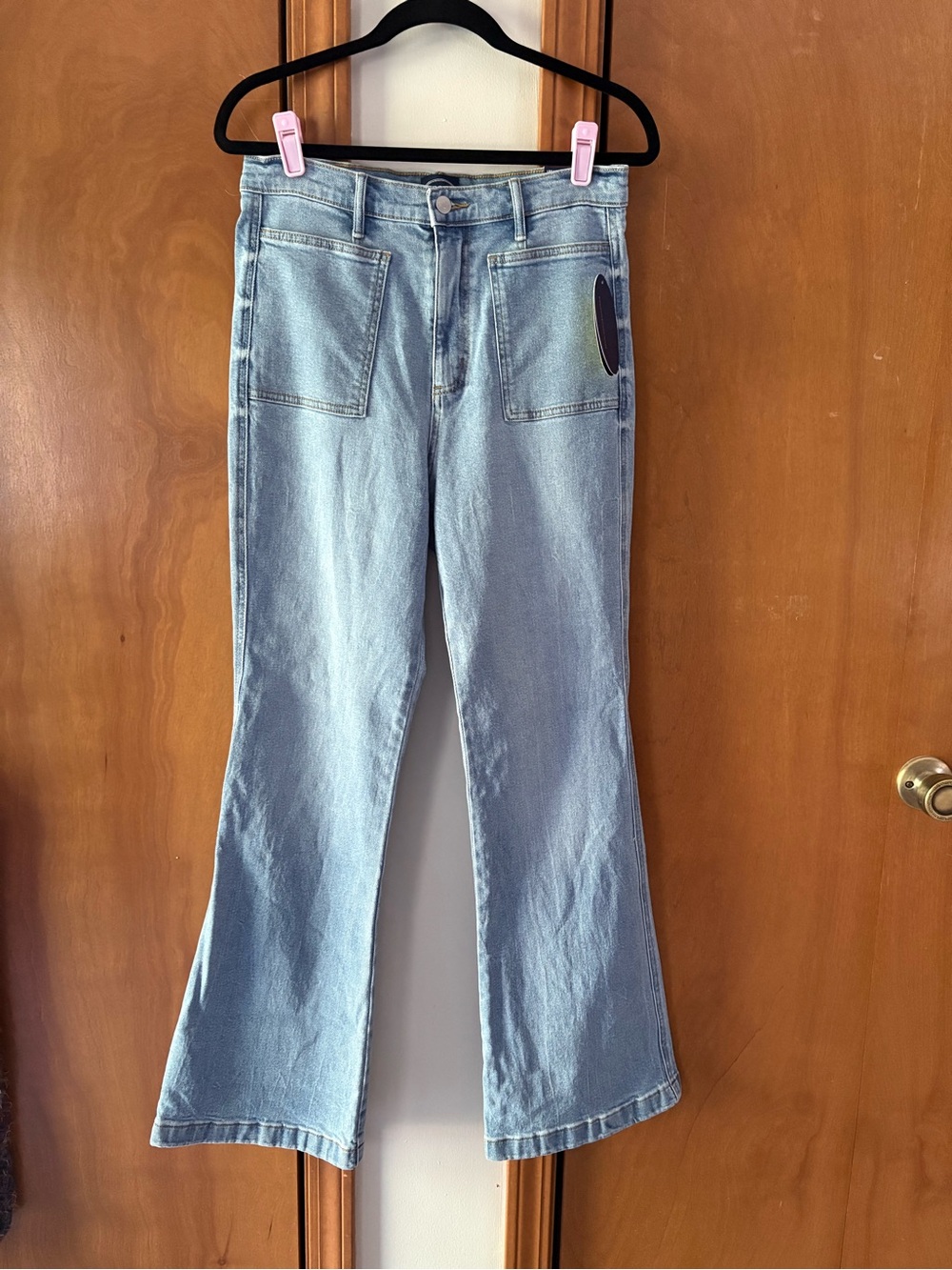 High-Rise Light Blue Flare Jeans with Front Patch Pockets